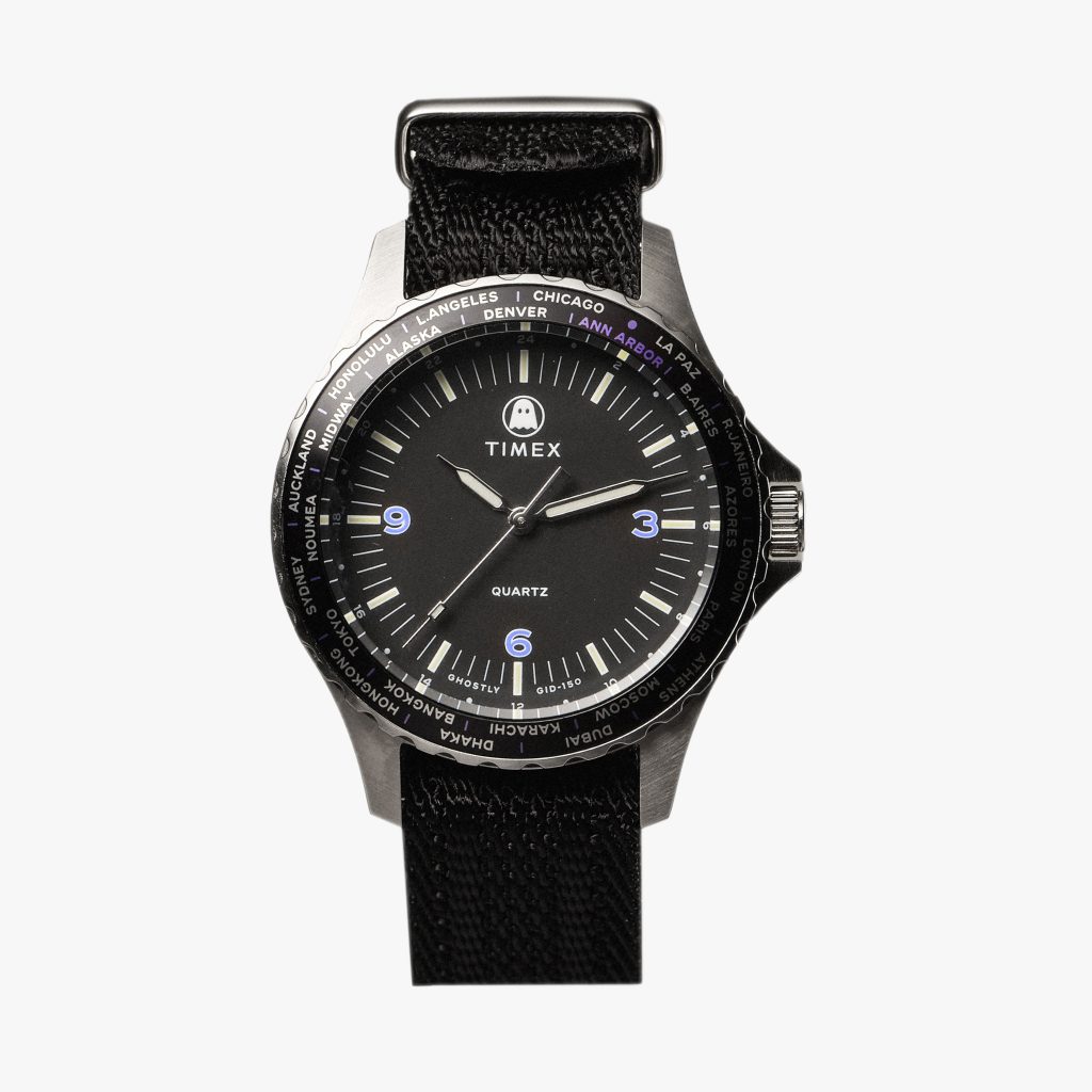 Stainles steel wristwatch with black dial and black fabric strap