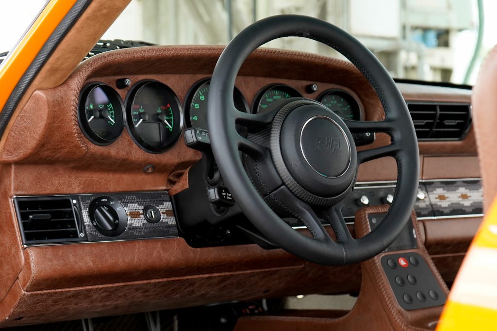 The interior of the RUF Rodeo showing its brown leather and fabric trim