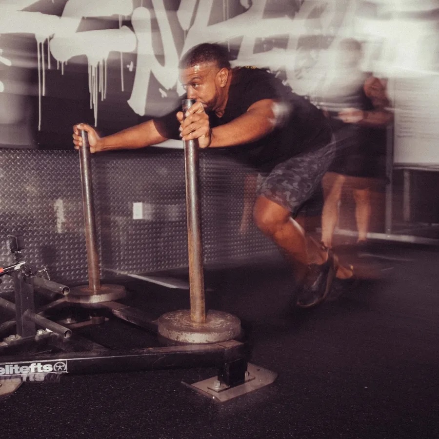 This is an image of a person working out wearing Vivobarefoot shoes